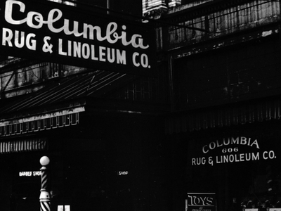 columbia rug & linoleum storefront street sign and window